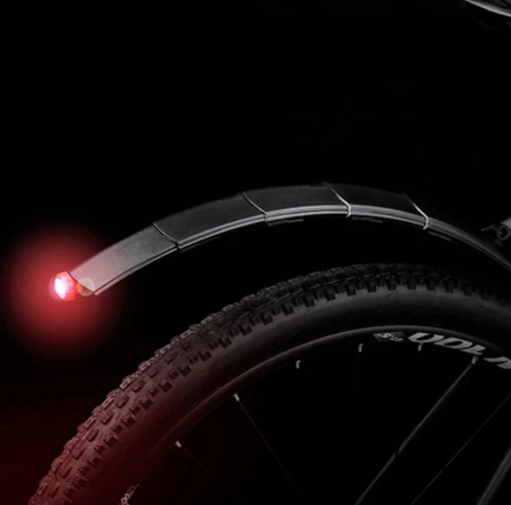 Adjustable bicycle mudguard